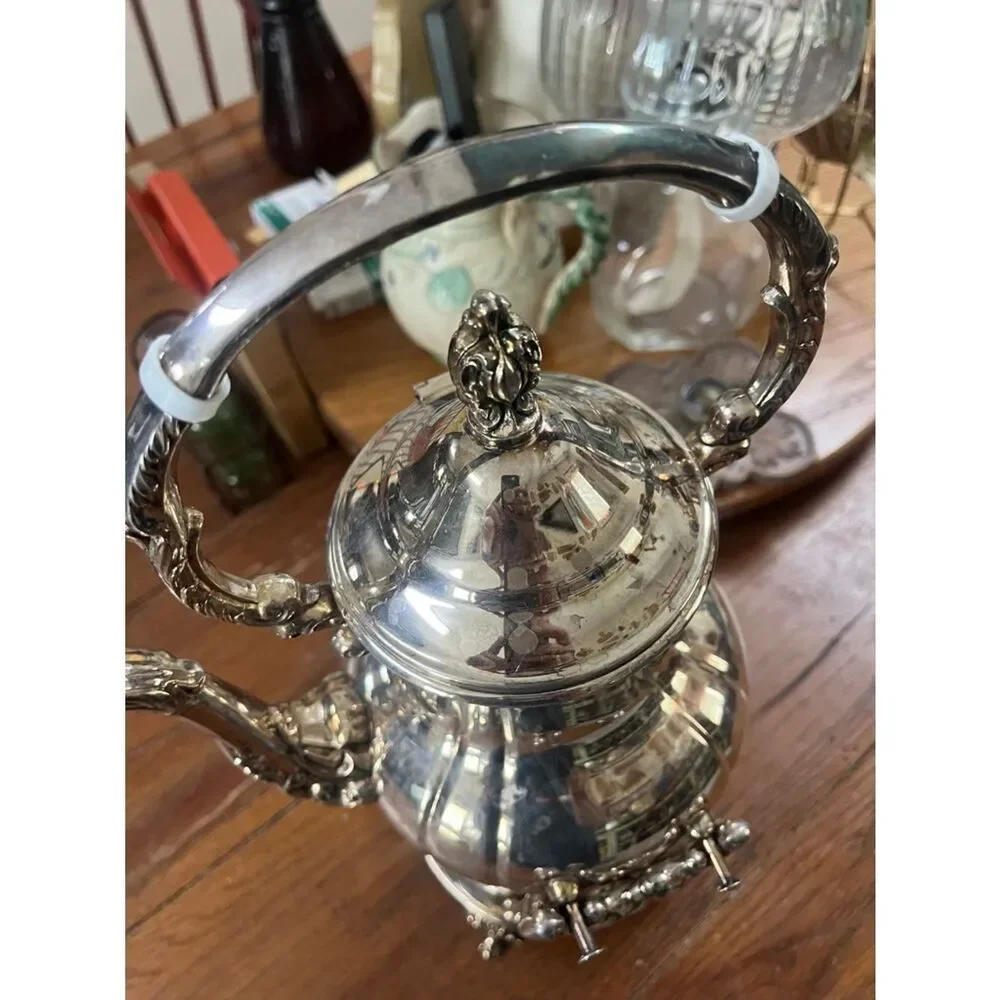 Towle tilting teapot